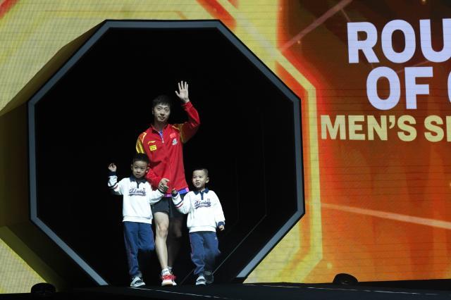 1727707161622027166.jpg 预测平台-马龙携子亮相大满贯赛场 36岁的老将还想赢还能赢